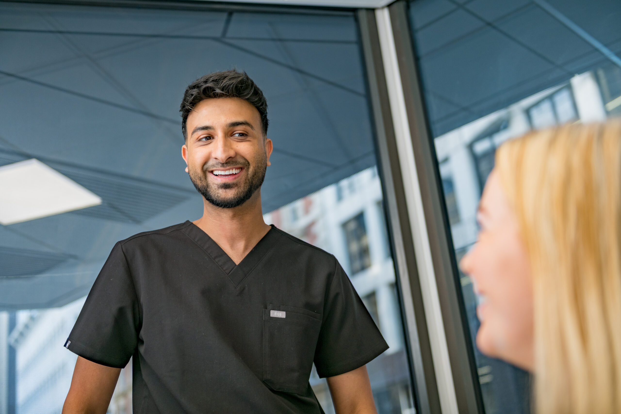 Portrait Photography - Dentist talking to staff