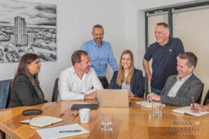 Corporate Team Portrait in a board room - Environmental Photography